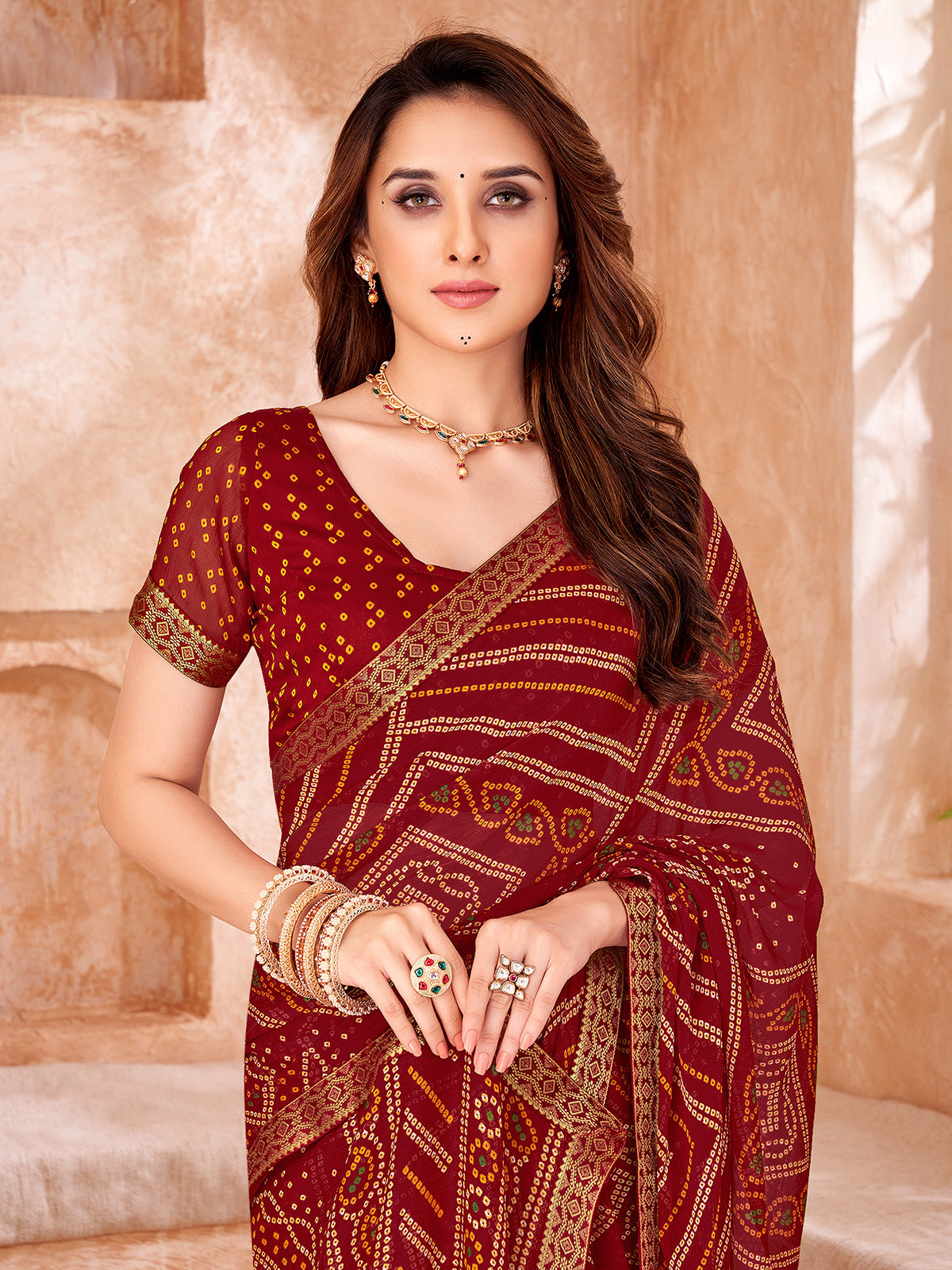Maroon chiffon printed saree for festive wear