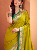 Mehendi green patola saree with traditional flair