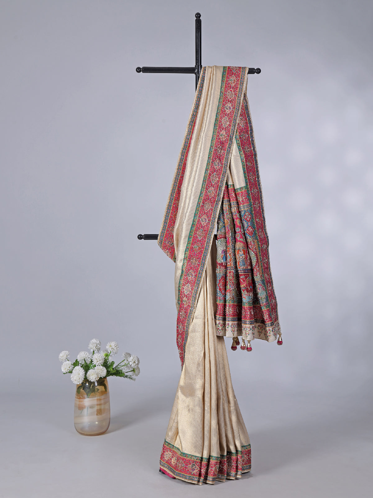 Off white soft tissue silk saree with elegant contrast border