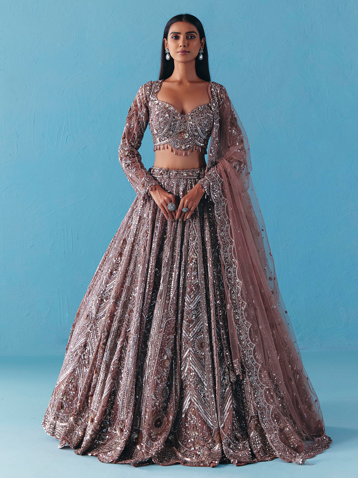 Onion pink net lehenga choli with full sleeve shine