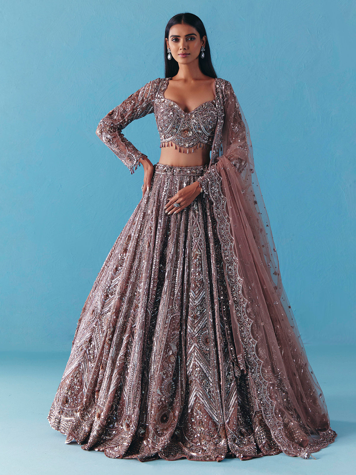 Onion pink net lehenga choli with full sleeve shine