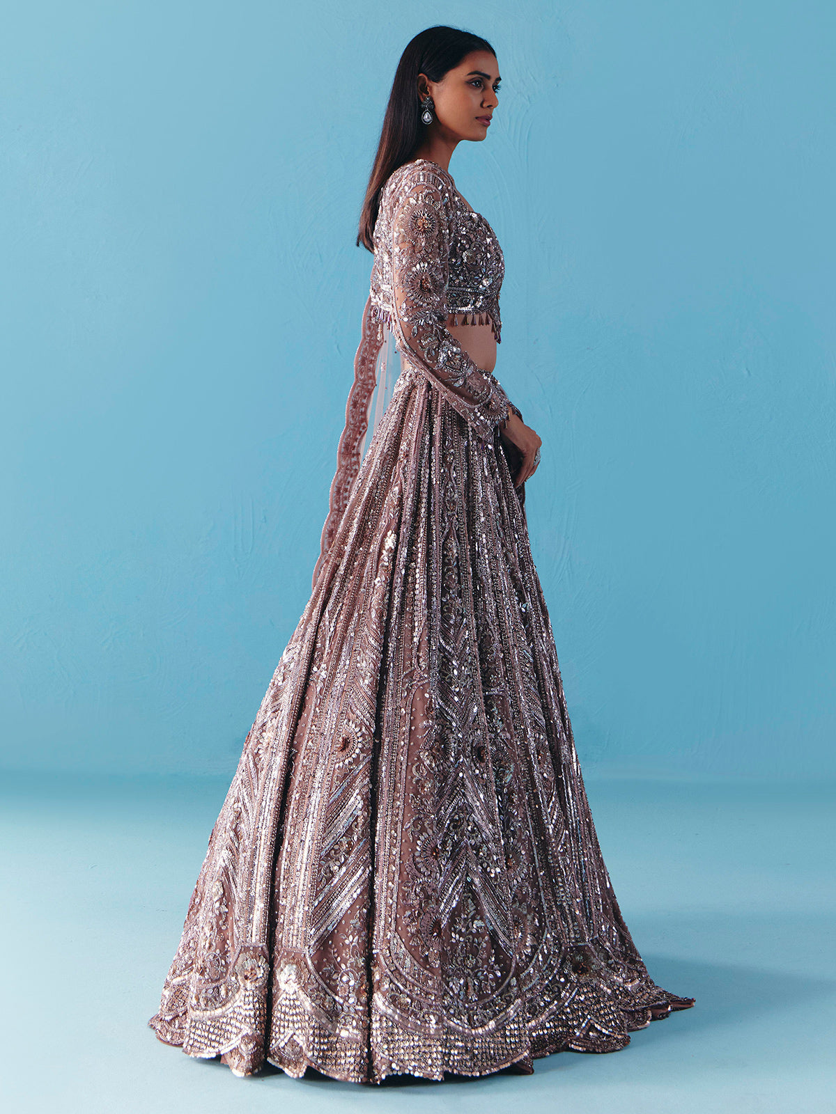 Onion pink net lehenga choli with full sleeve shine