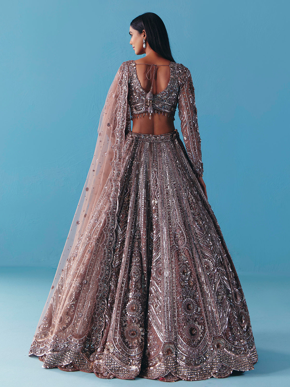 Onion pink net lehenga choli with full sleeve shine