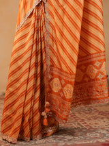 Orange printed silk saree with aabla accents