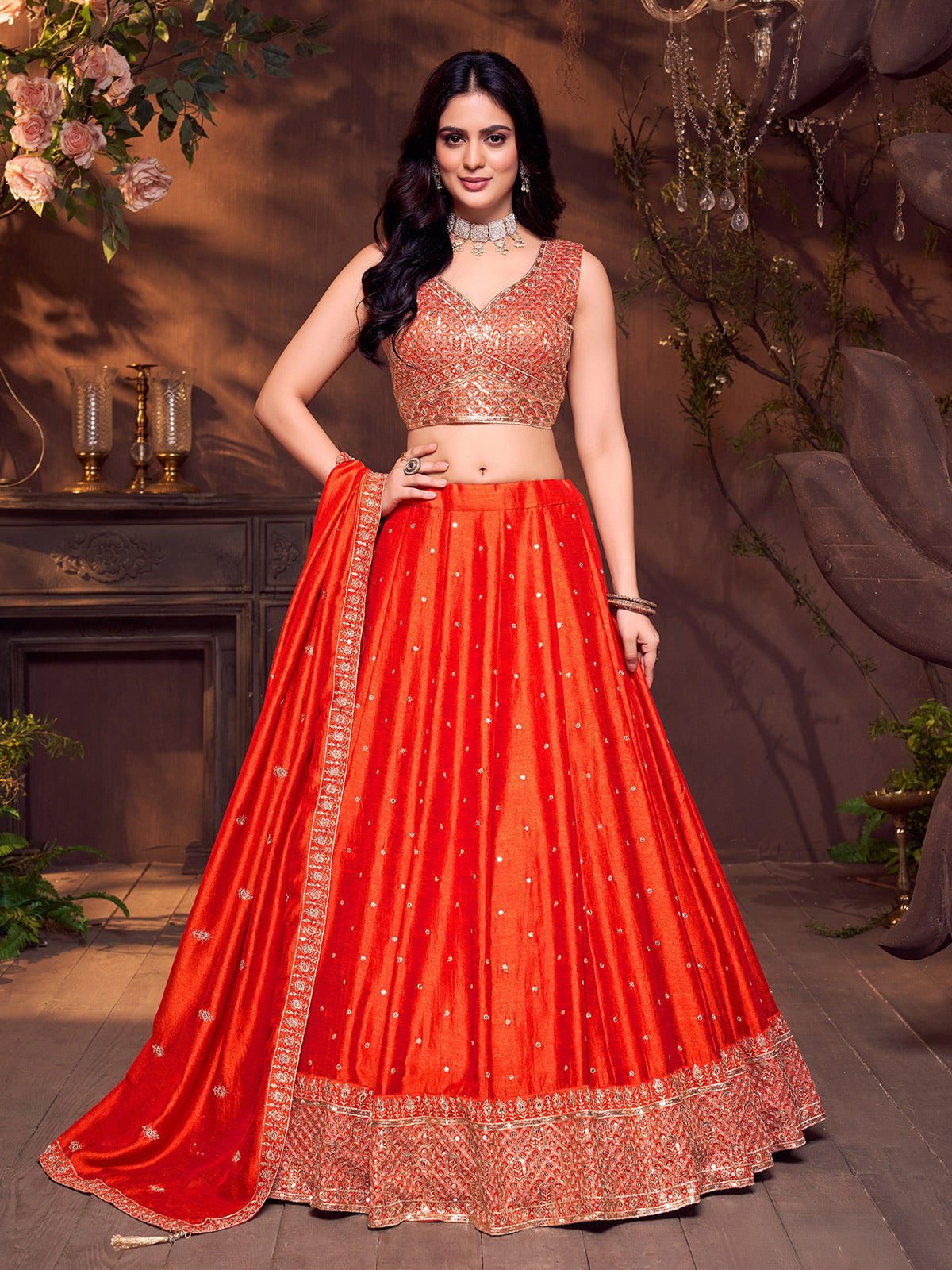 Orange silk sweetheart neck embellished lehenga choli