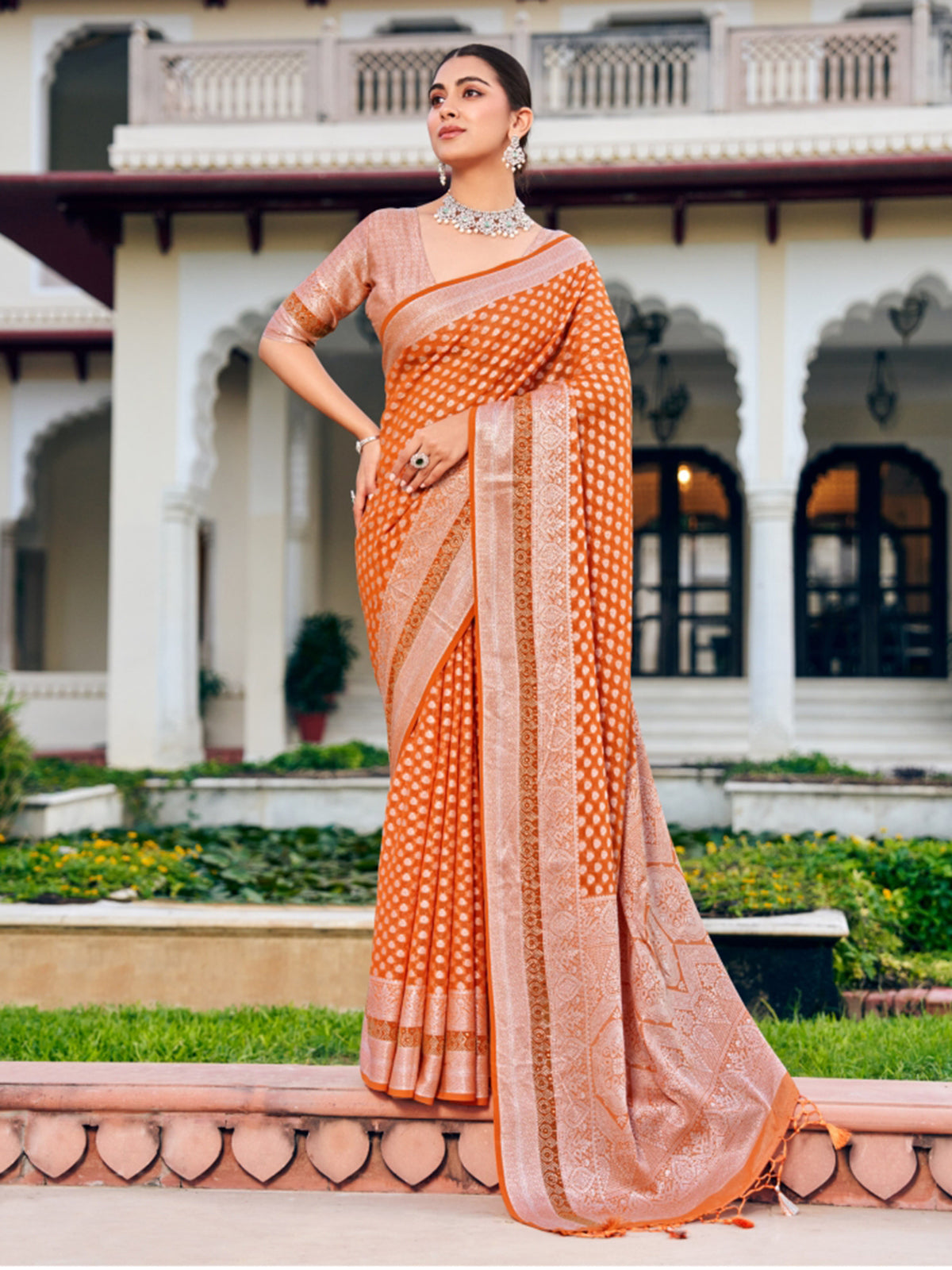 Peach saree with zari in soft georgette