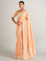 Peach silk zari worked saree with unstitched blouse