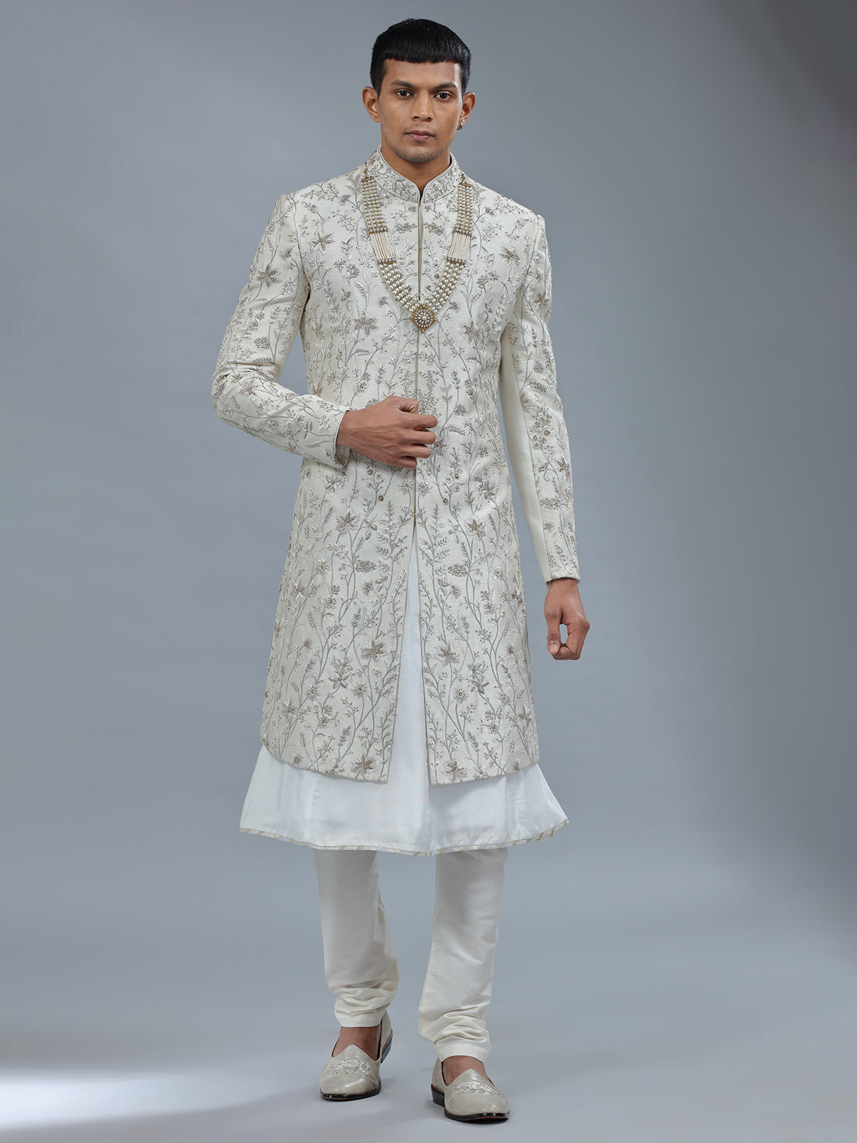 Peshwai style off white raw silk shewani for groom