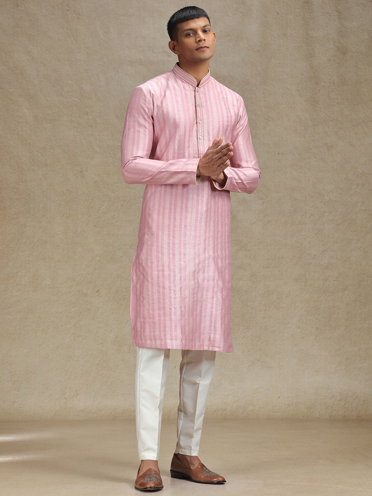 Pink kurta pajama in textured stripe pattern