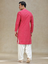 Pink kurta salwar in symmetrical embroidery pattern