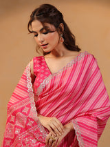 Pink printed silk saree with aabla highlights