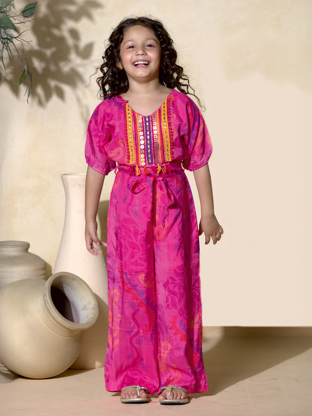 Pink silk printed jumpsuit for girls with belt