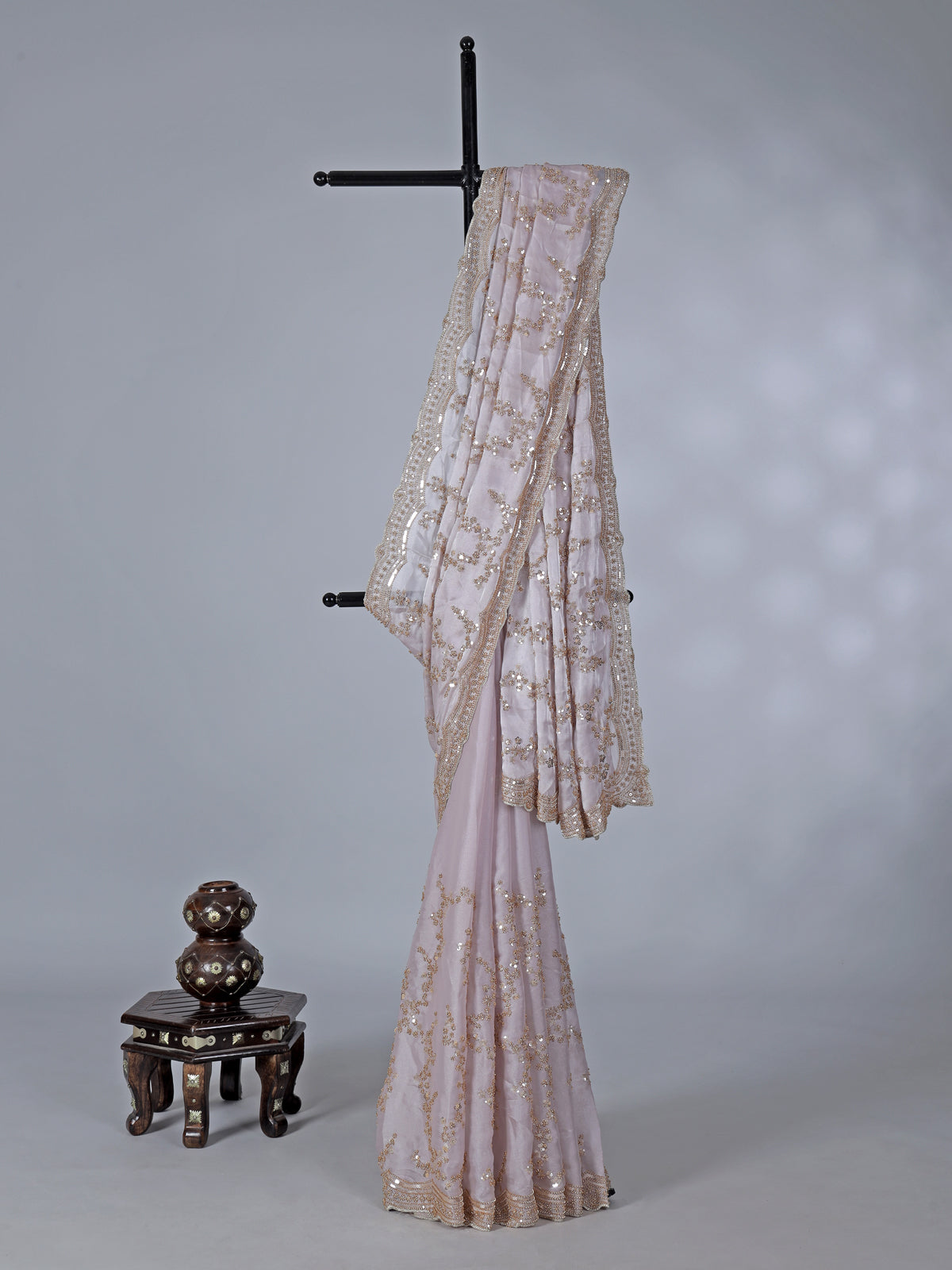 Pink tissue silk saree with sequins and resham accents
