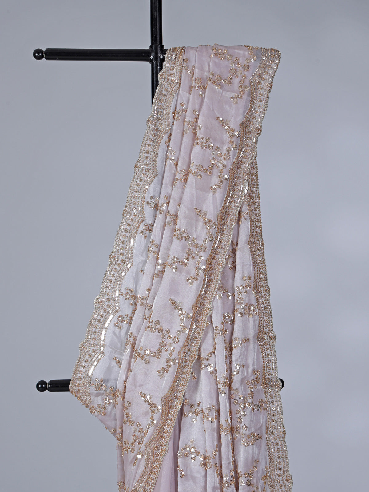 Pink tissue silk saree with sequins and resham accents