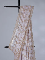 Pink tissue silk saree with sequins and resham accents