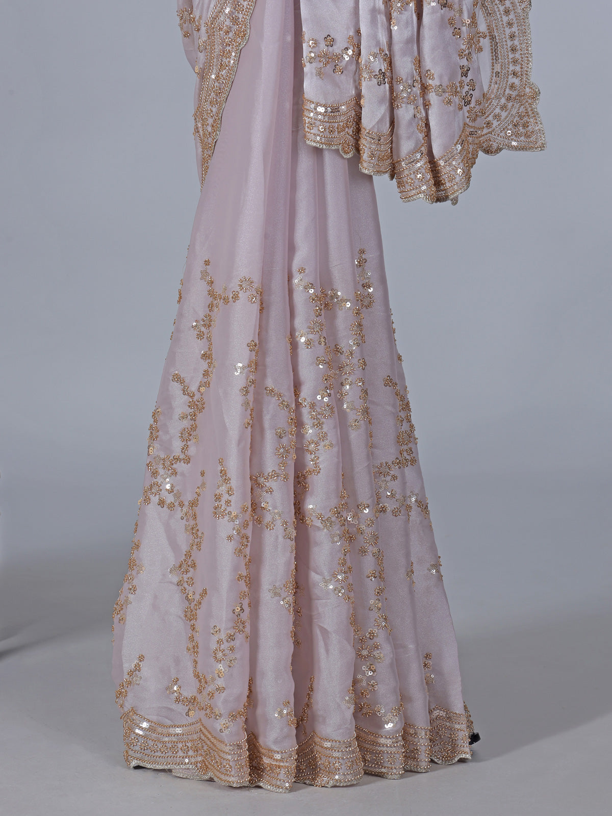Pink tissue silk saree with sequins and resham accents