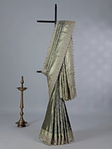 Pista green kanjivaram silk saree with ornate embellishments