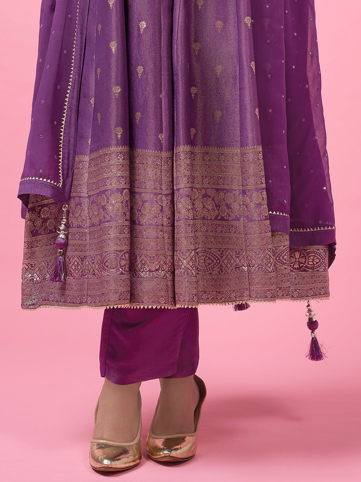 Purple silk anarkali suit with zari detailing