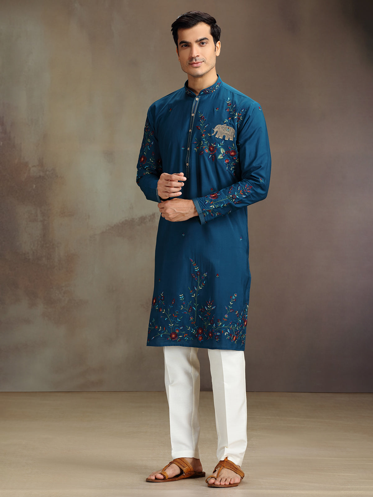 Rama blue silk embroidered and stone work kurta suit