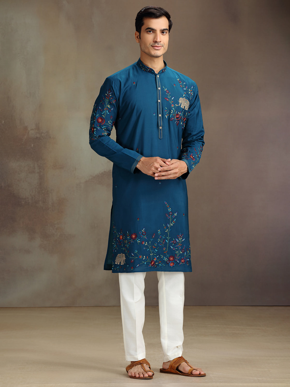 Rama blue silk embroidered and stone work kurta suit