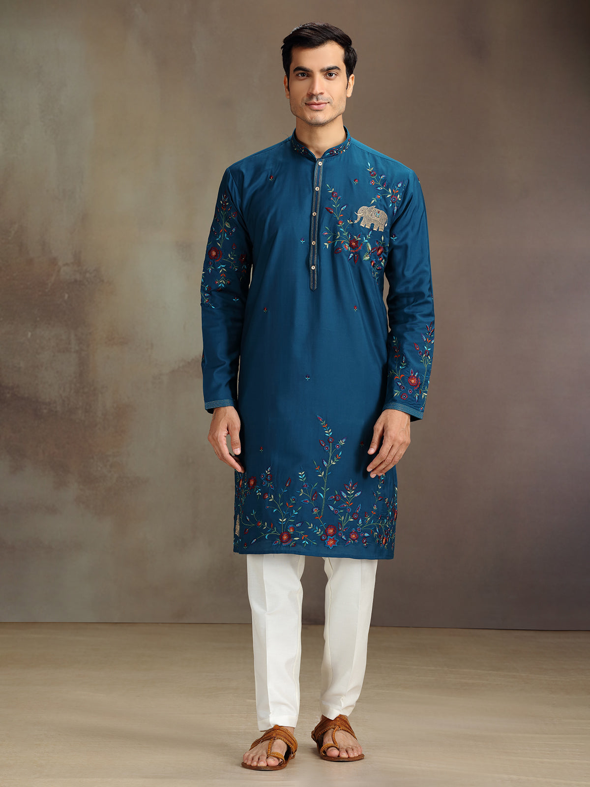 Rama blue silk embroidered and stone work kurta suit