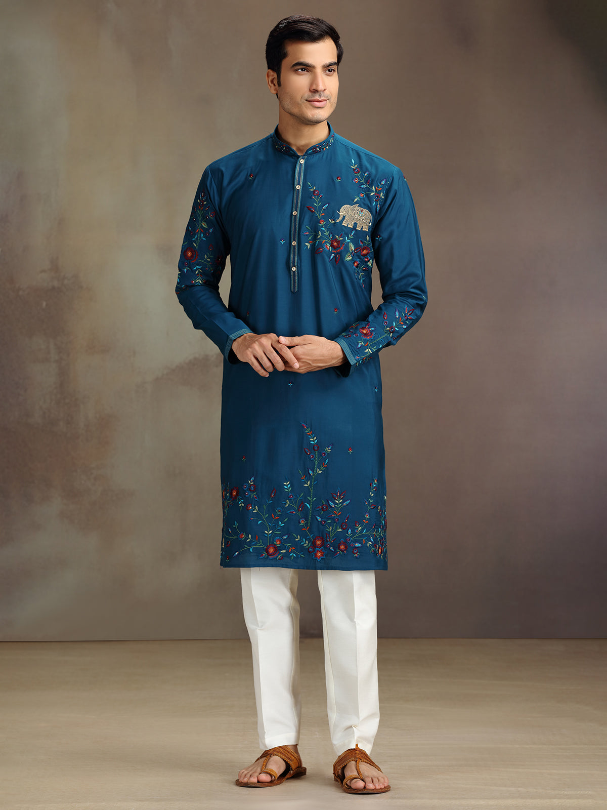 Rama blue silk embroidered and stone work kurta suit