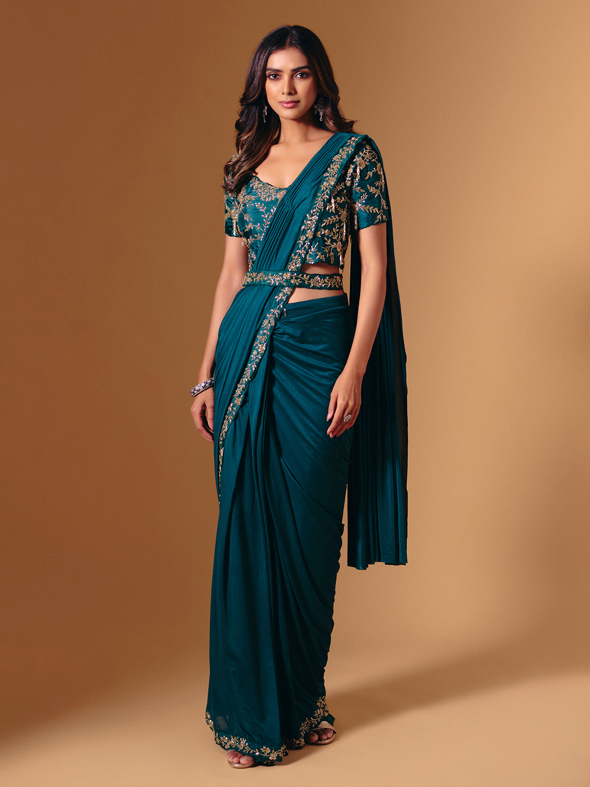 Rama green satin lycra saree with sparkling cutdana work