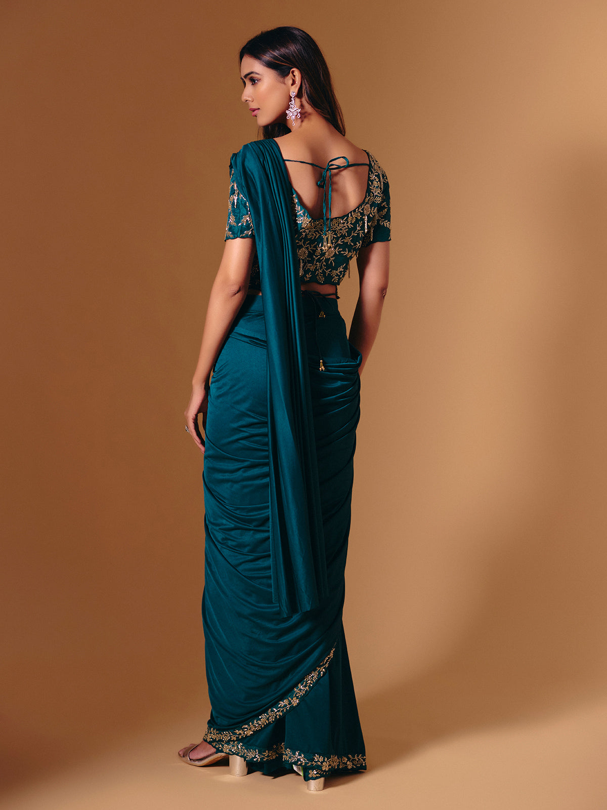 Rama green satin lycra saree with sparkling cutdana work