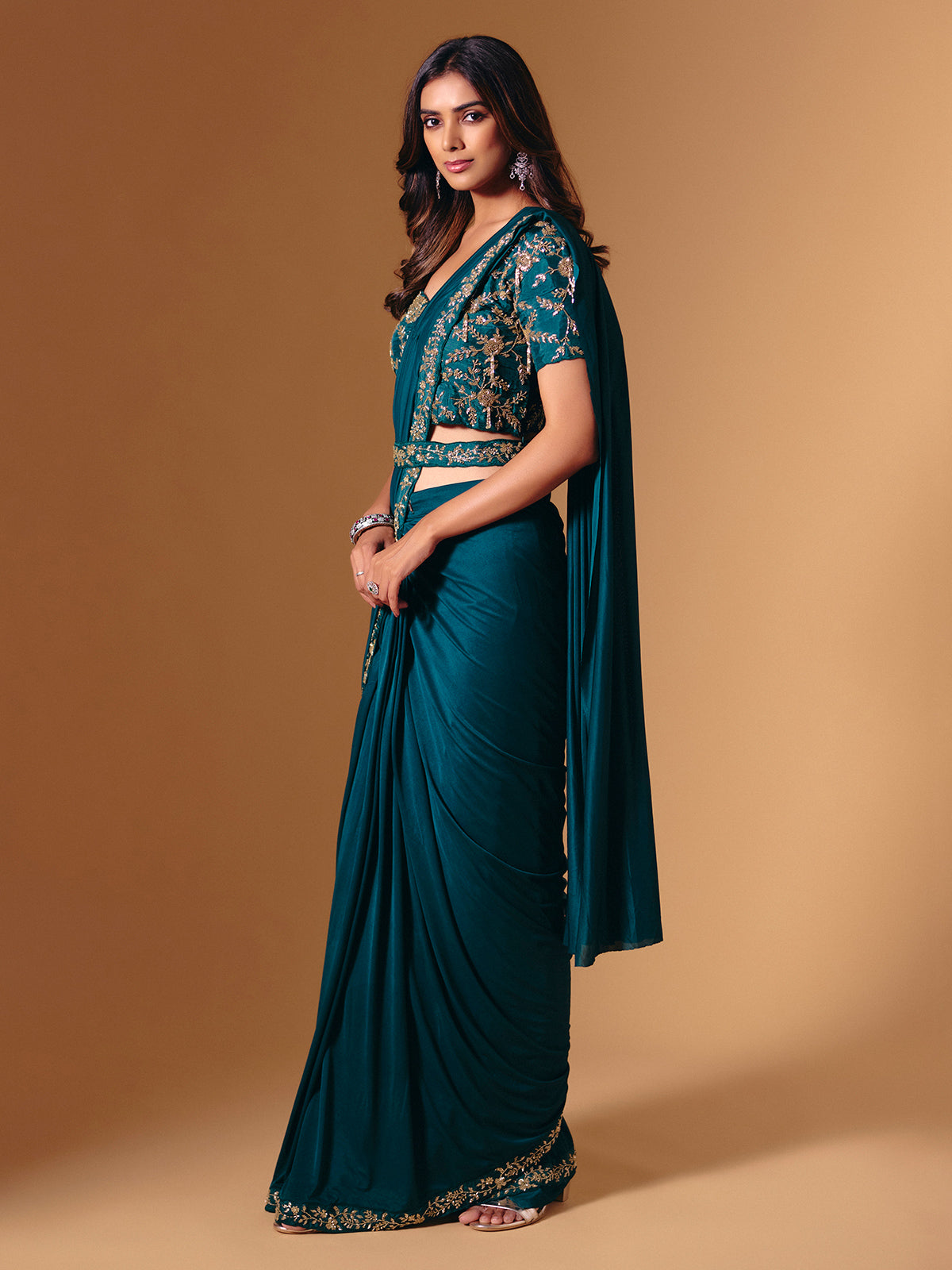 Rama green satin lycra saree with sparkling cutdana work