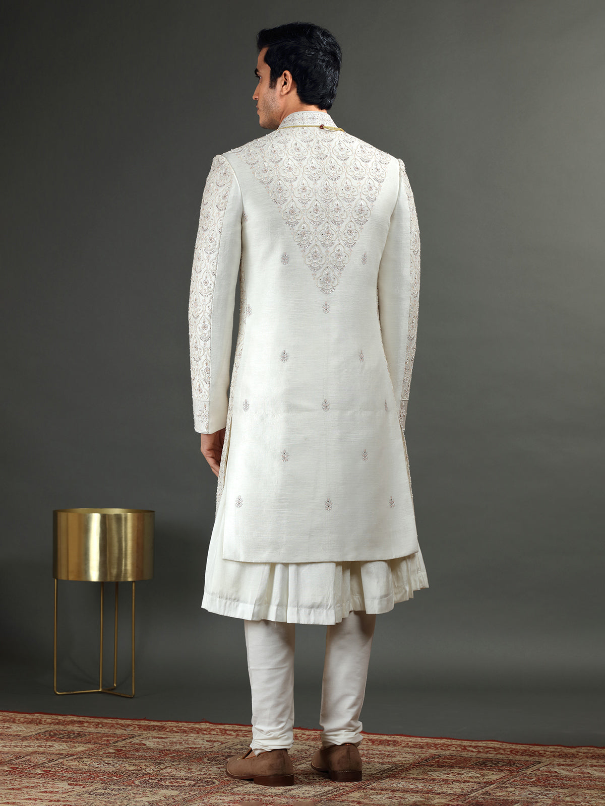 Raw silk groom sherwani in off white