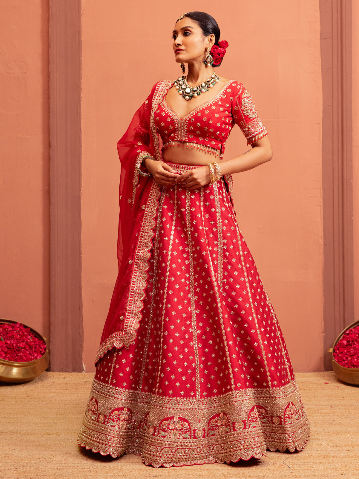 Red bridal lehenga choli with elbow sleeve blouse