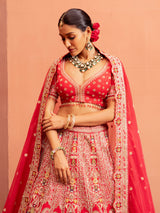Red bridal lehenga choli with embellished blouse