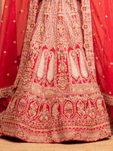 Red bridal lehenga choli with embellished blouse