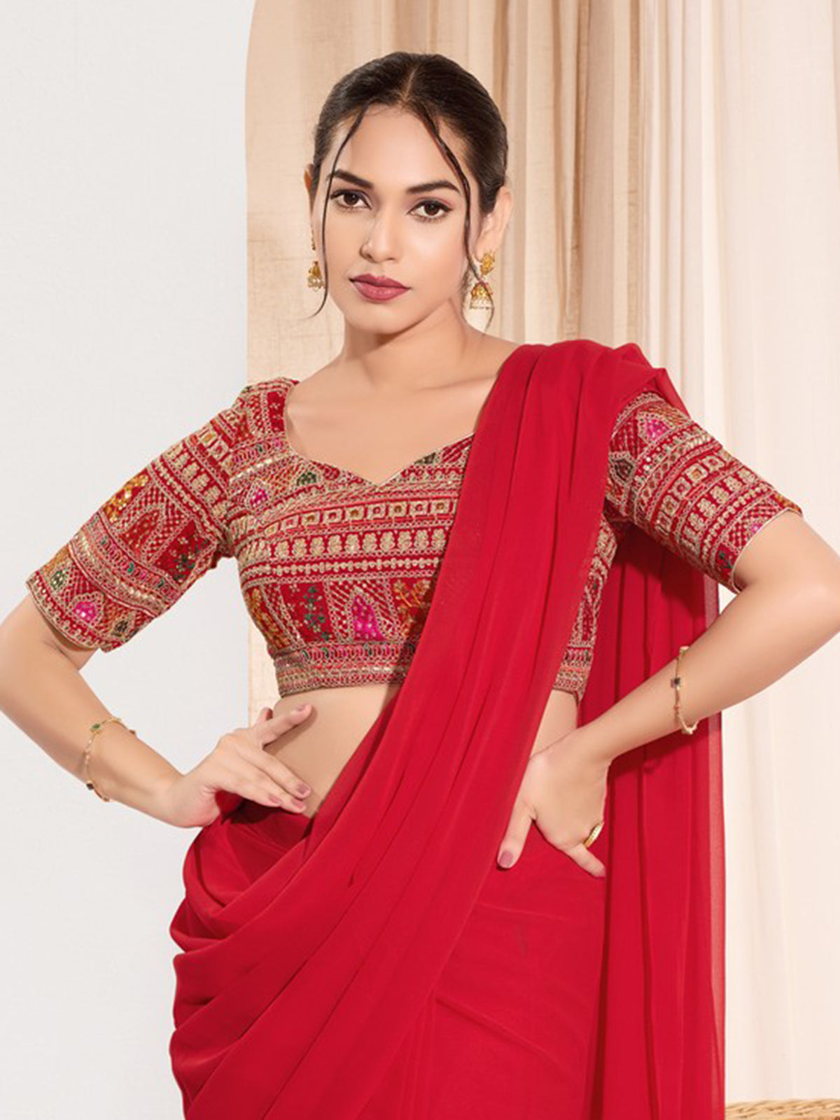 Red brocade blouse with embroidery and sequins work