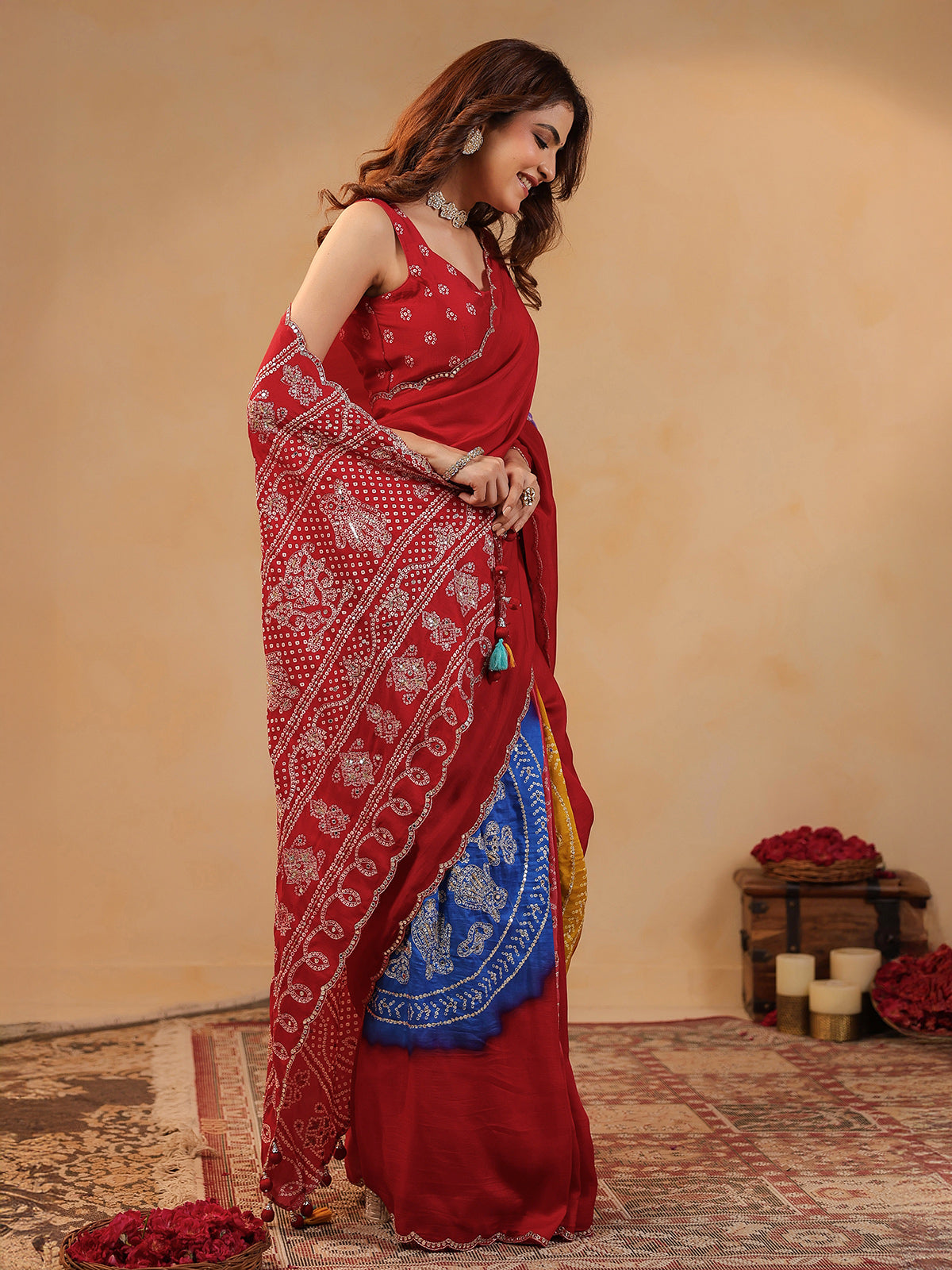 Red printed silk saree with aabla embellishment