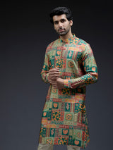 Rich silk green kurta suit in unique ethnic print