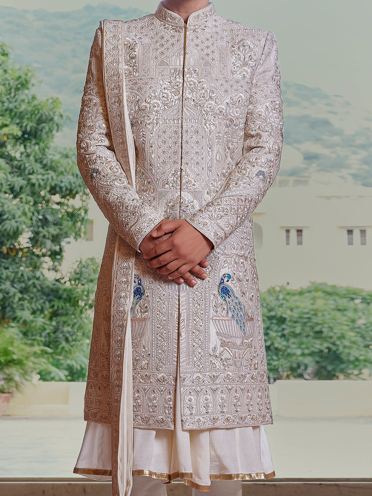 Royal cream peshwai style sherwani with resahm work