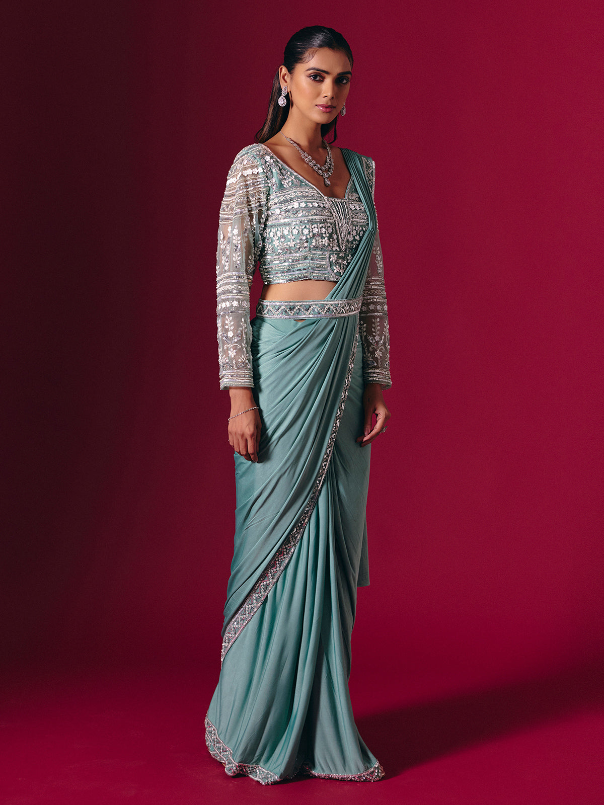 Sage green lycra saree with luxurious multi work detailing