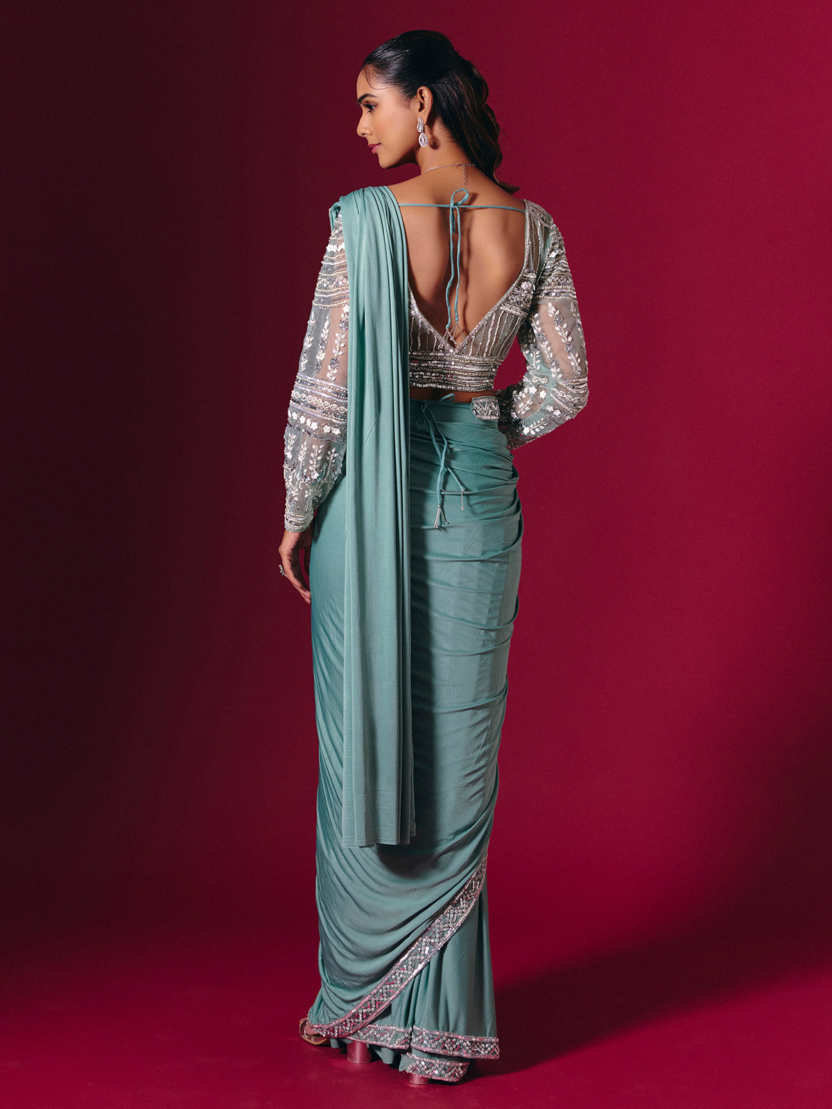Sage green lycra saree with luxurious multi work detailing