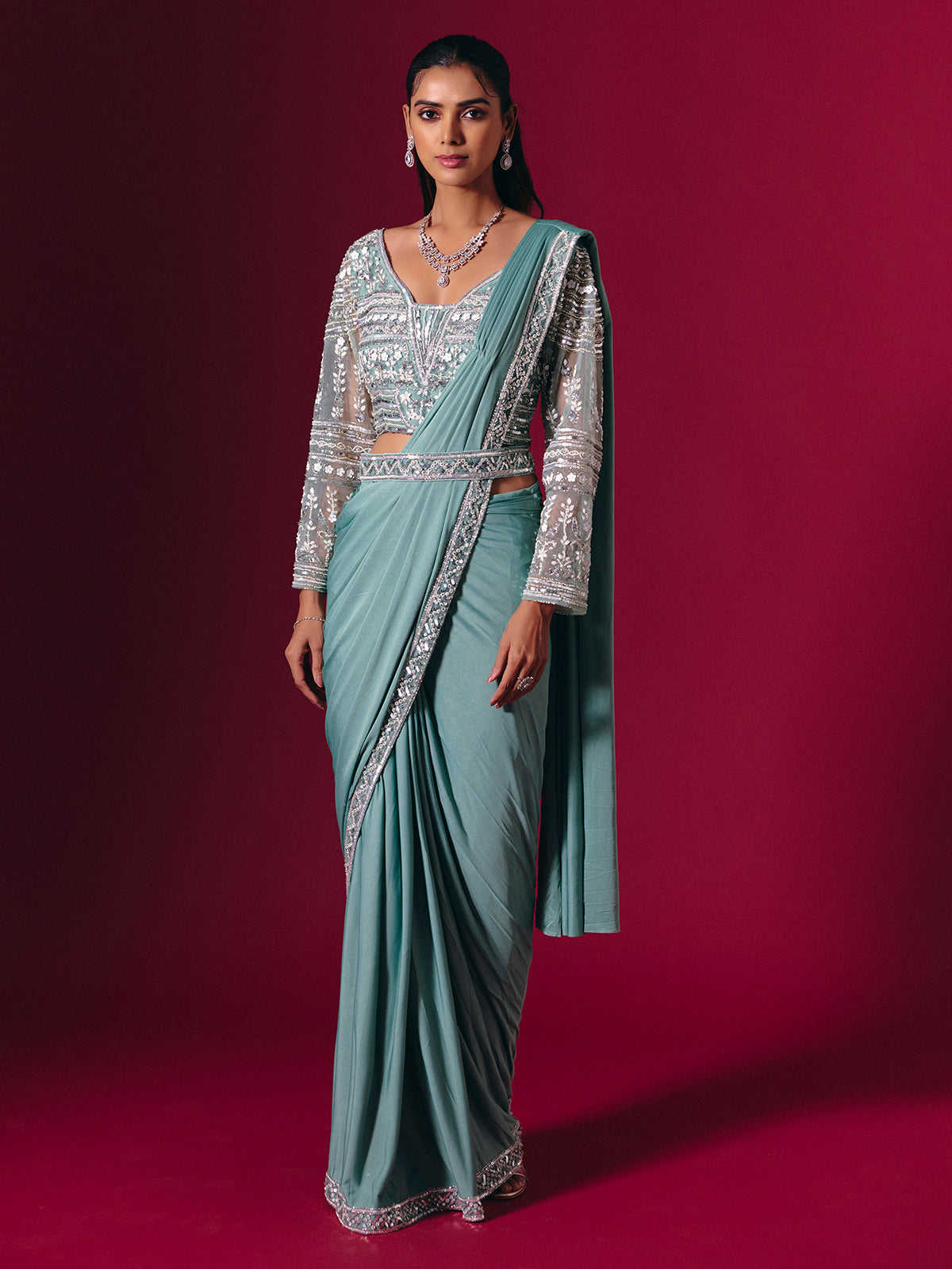 Sage green lycra saree with luxurious multi work detailing