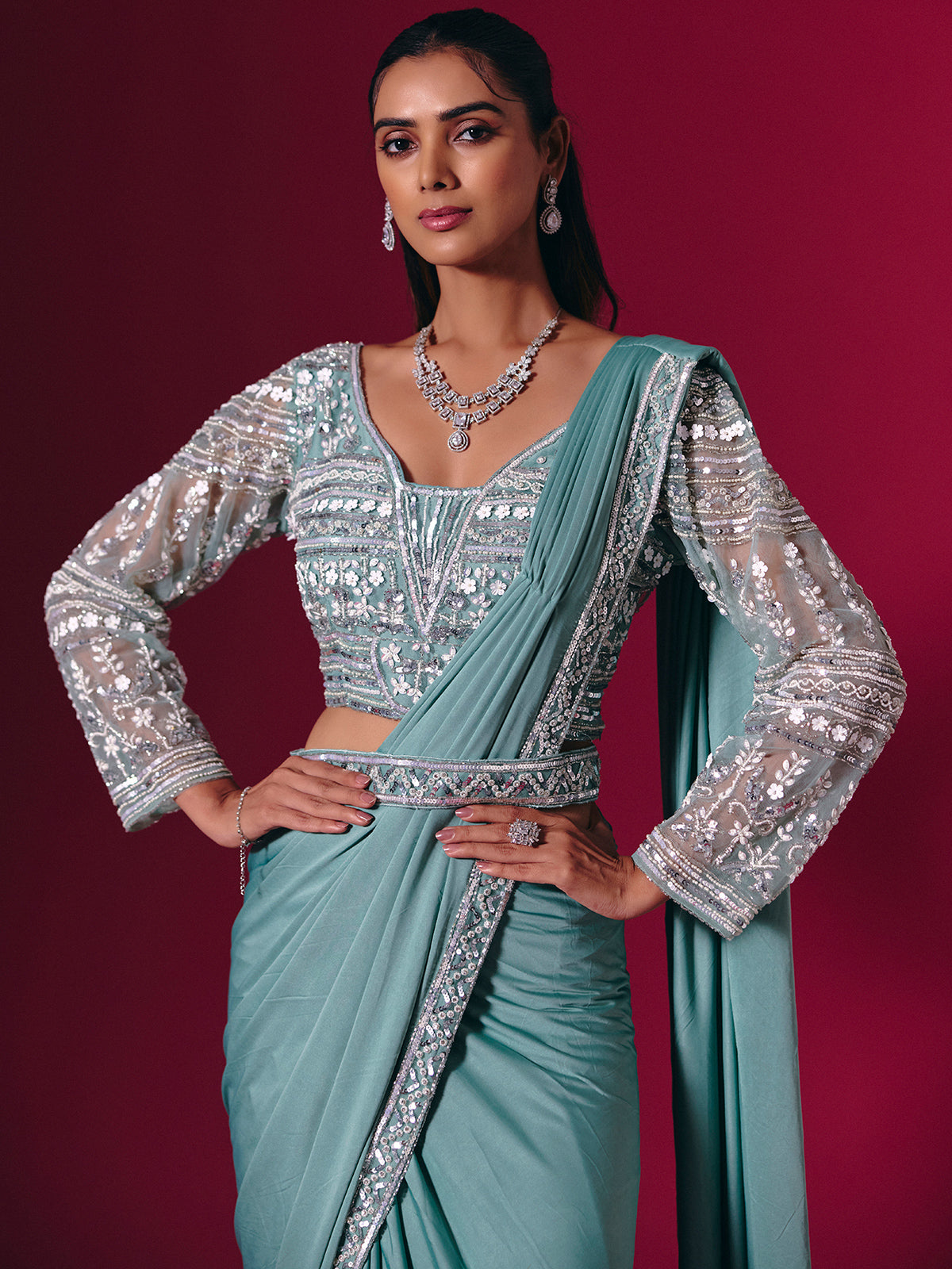 Sage green lycra saree with luxurious multi work detailing