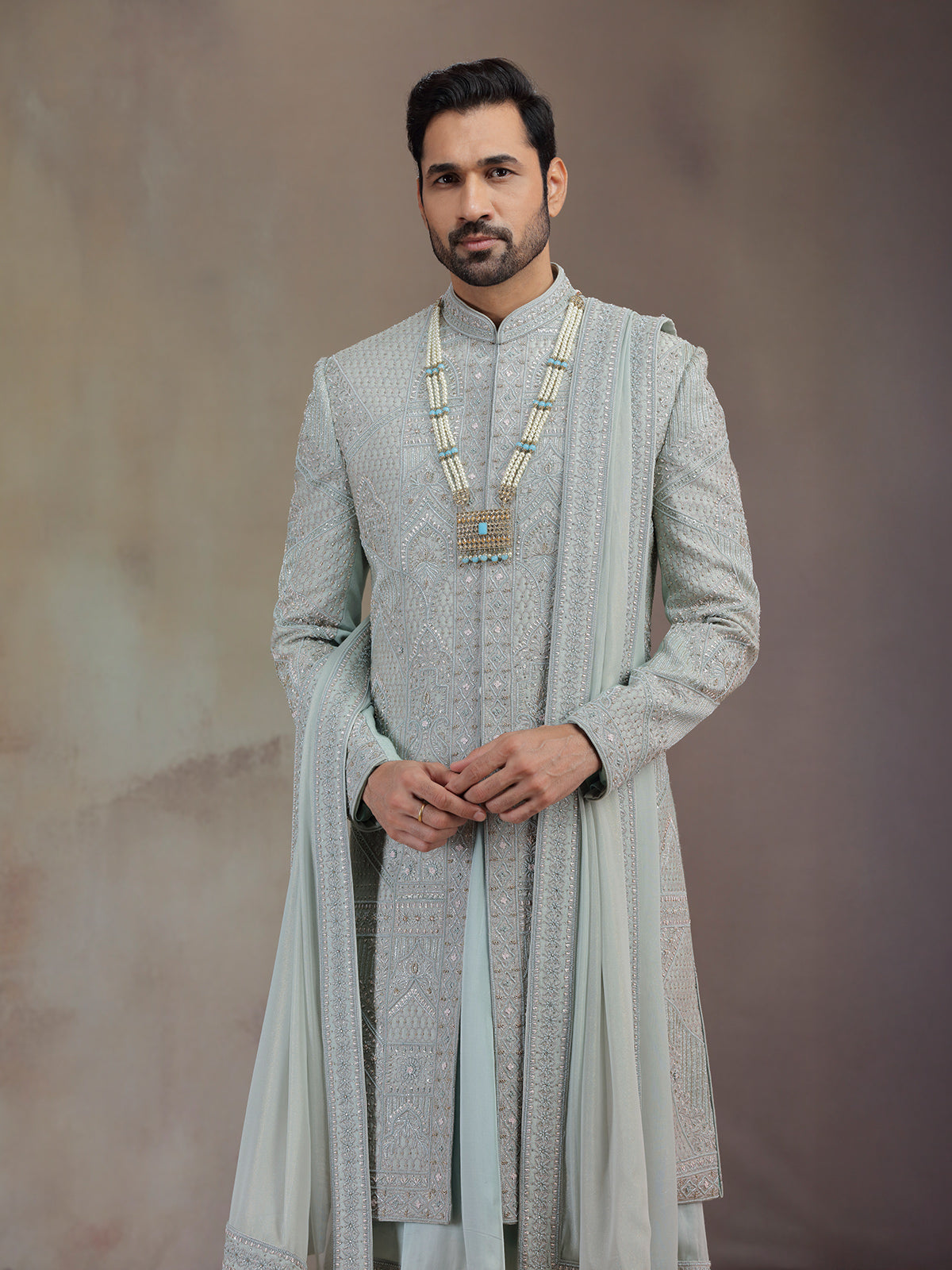 Sea green silk groom sherwani with dupatta