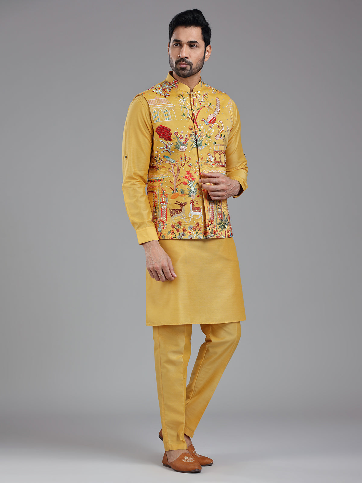 Shiny yellow multi coloured embroiderired kurta jacket set