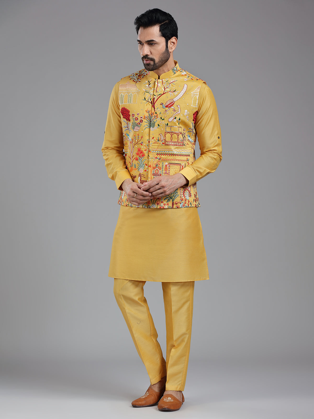 Shiny yellow multi coloured embroiderired kurta jacket set