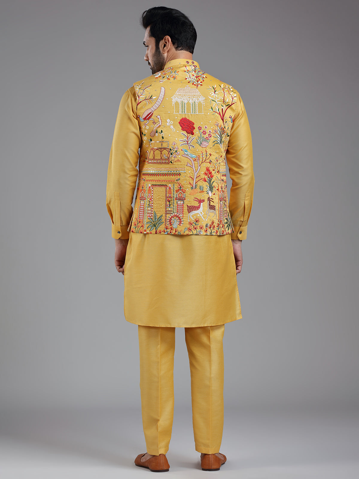Shiny yellow multi coloured embroiderired kurta jacket set