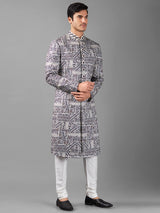 Stunning white embroidery sherwani