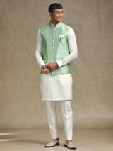 White and light green waistcoat set with intricate embroidery