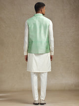 White and light green waistcoat set with intricate embroidery