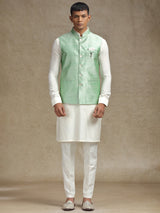 White and light green waistcoat set with intricate embroidery