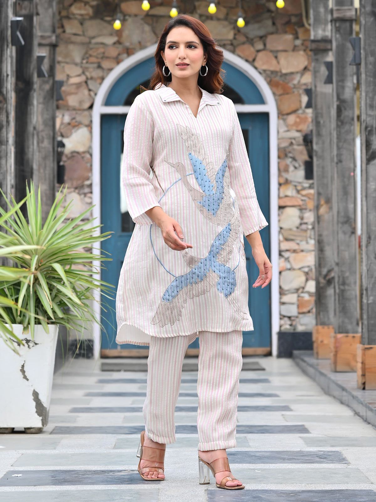 White striped suit with chic collar finish